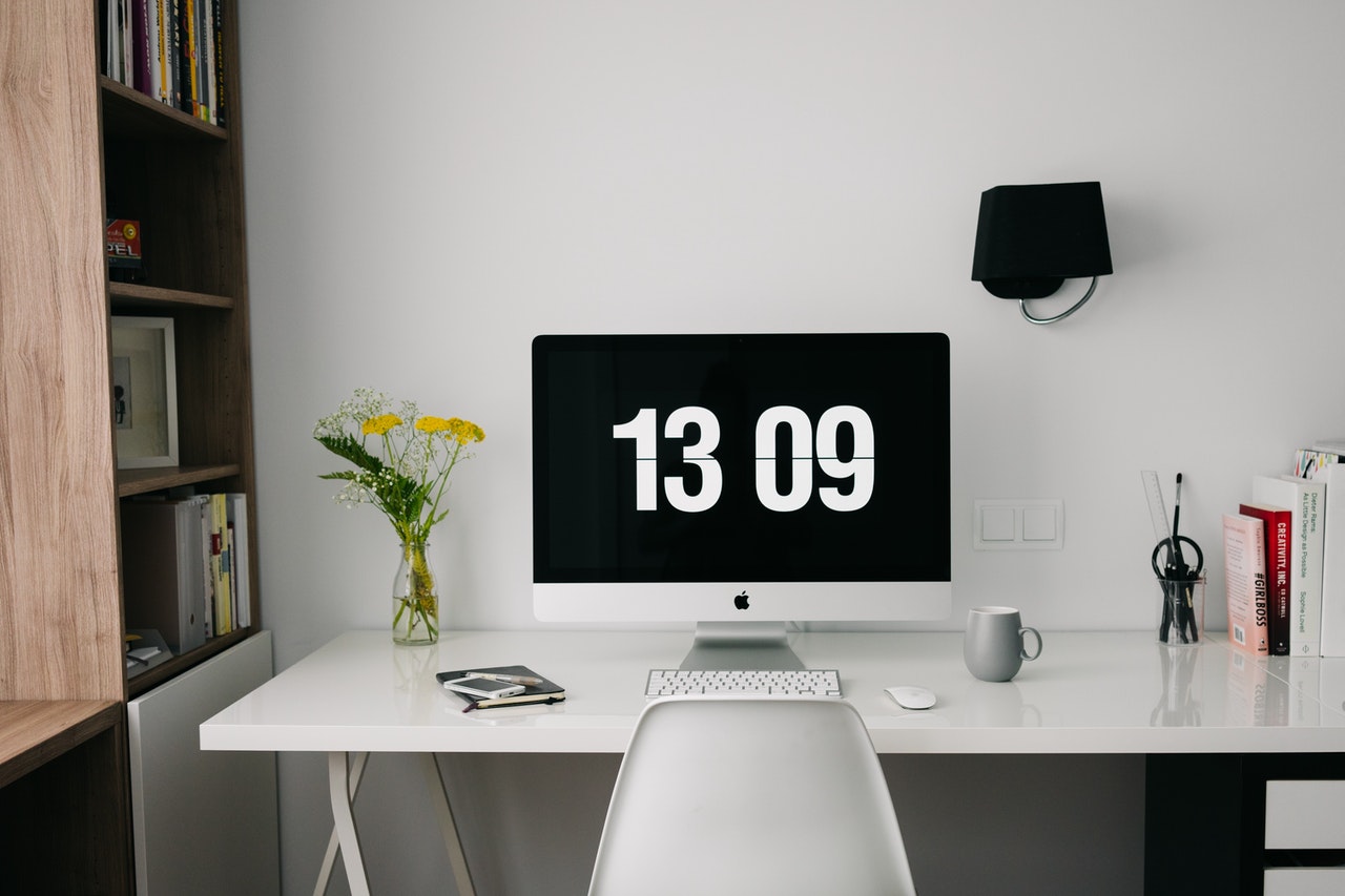 macbook pro on work desk